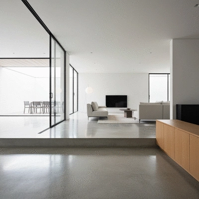 Modern living room with polished concrete floors, minimalist furniture